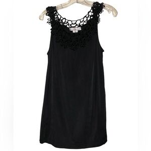 Black sleeveless top with collar detail size M